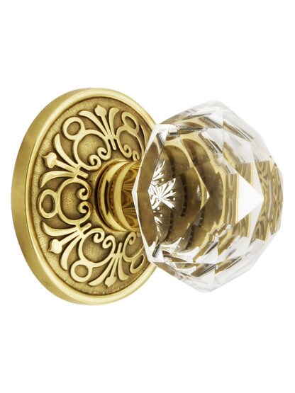 Lancaster Rosette with Diamond Knobs in Polished Brass.